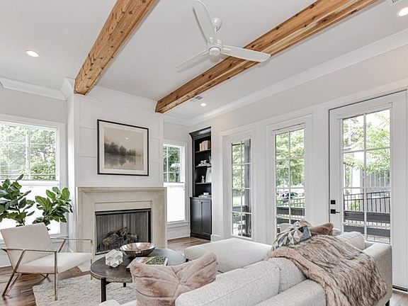 Remote control gas fireplace, 10' ceilings and dual adjusting blinds