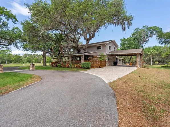 800 Hidden Oaks Ln, Oak Hill, FL 32759