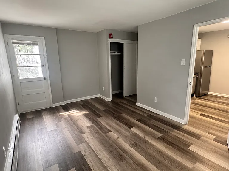 Primary Bedroom with door to balcony