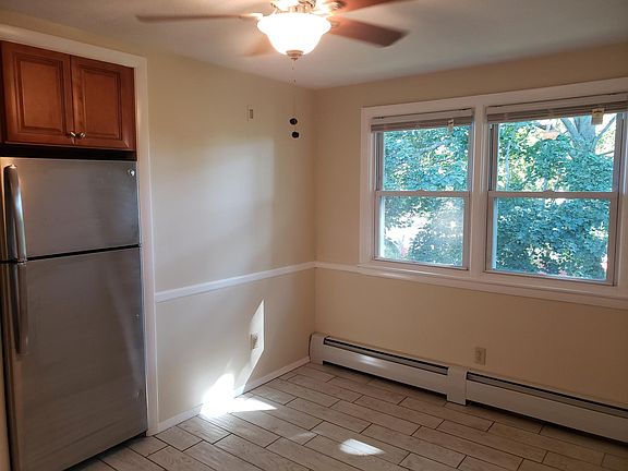 Kitchen windows, view of back yard