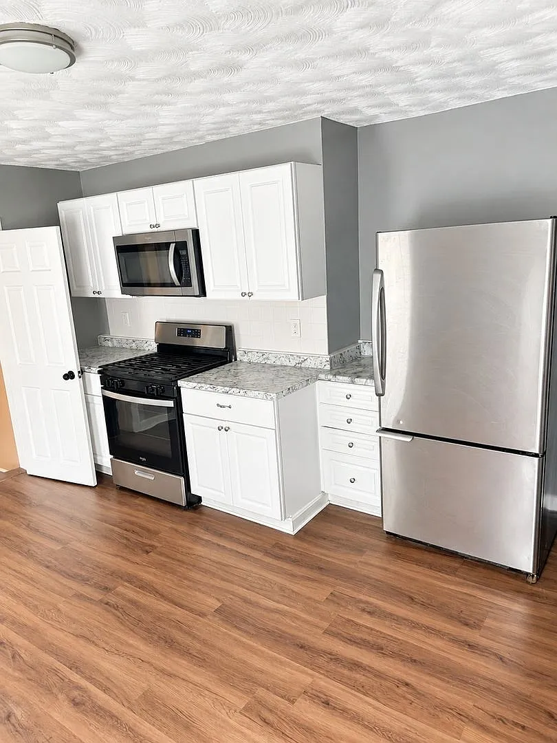 Charming 2BR Duplex in Lowell — Photo 1