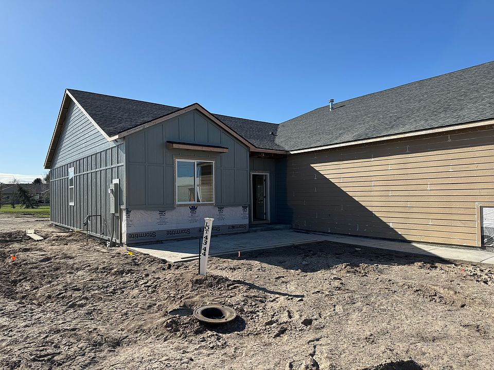 43 Front Exterior halfway painted