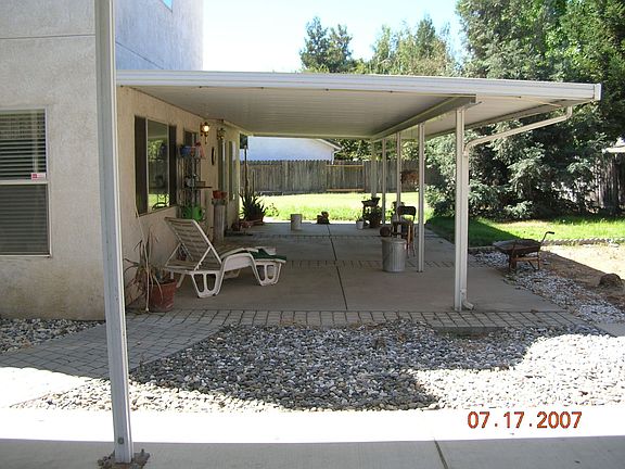 Back yard with covered patio