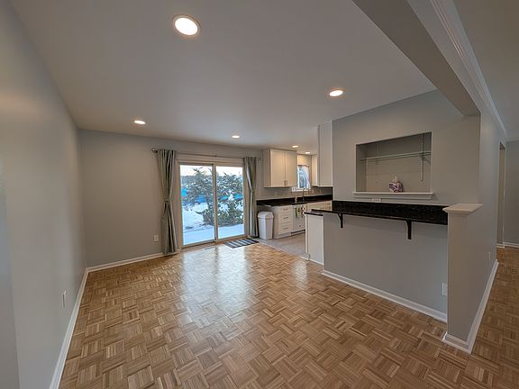 Roomy dining room with butler serving counter or study nook