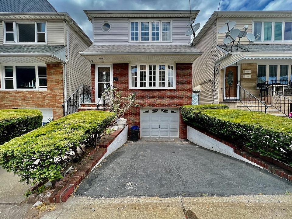 1 Driveway + 1 Garage Space in Tandem Included