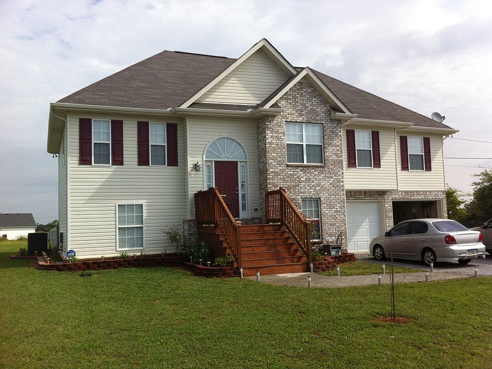 Front view with new entrance and landscaping!