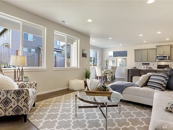Example of Plan 2353 A built on another lot at Hawksbeard.  Details & colors will vary.