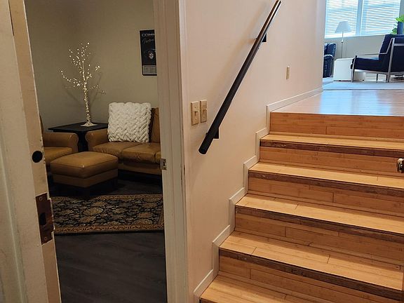 Bonus room near front door. Great to store bikes or enjoy some quiet.