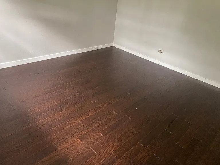 Gorgeous new coffee bean brown wood floors in all three bedrooms and hallways!