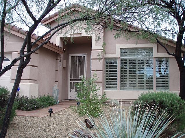 Front w/professional landscaping