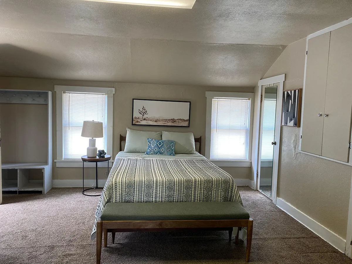 Comfortable Bed and chairs. Lots of windows for natural lighting. - 327 E Duffy St