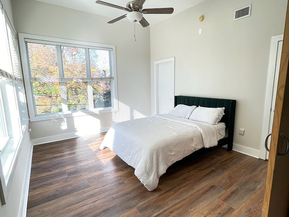 Master Bedroom with in suite bathroom, large walk in closet and barn door entrance