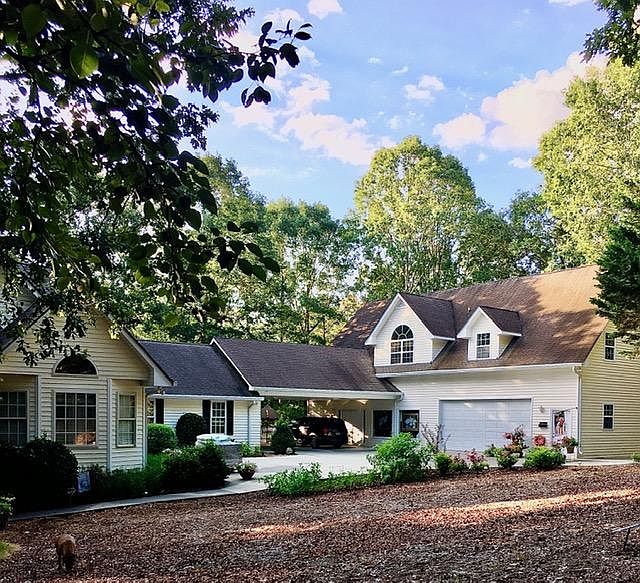 Owners home and entry to loft on right