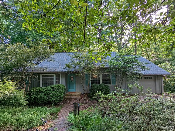 Landscaped Front Yard & Front Face of House, with garden stairs & garage