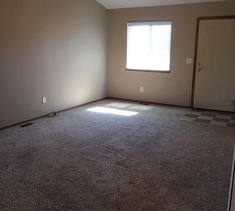 Living room with vaulted ceiling