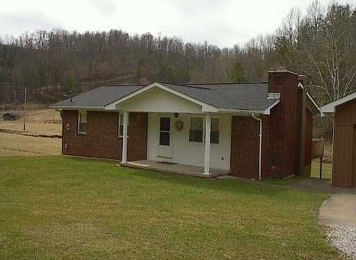 Beautiful 3 bedroom Rancher nestled in a gorgeous country setting. 