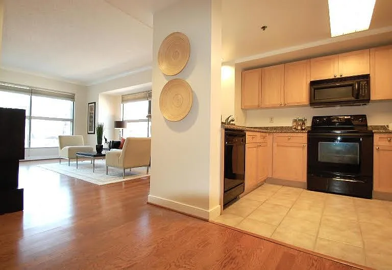 Open Living and Dining Area with Hardwood Flooring