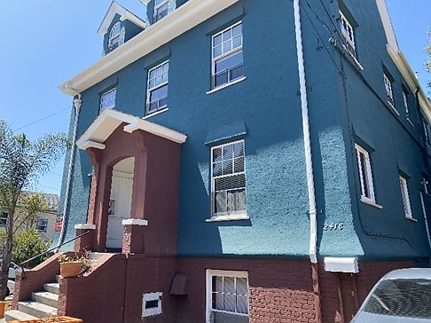 Side view exterior of the apartment building at 2129 Haste St, Berkeley, CA 94704, USA