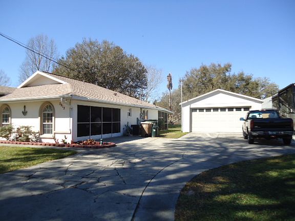 4 car garages/workshop