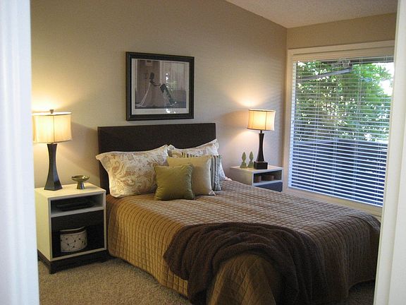Main floor bedroom with private deck off front
