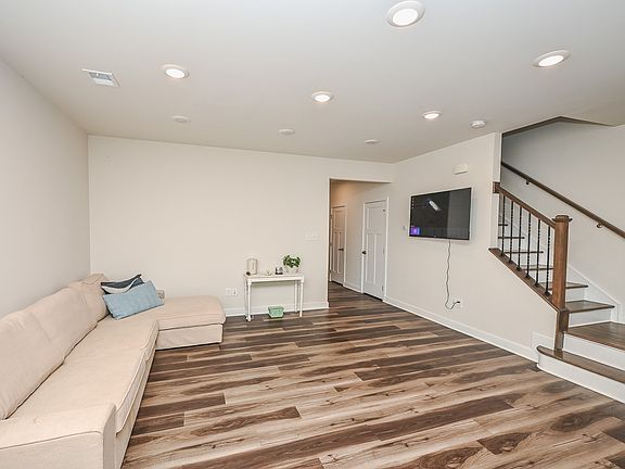 Open living room with luxury vinyl plank flooring