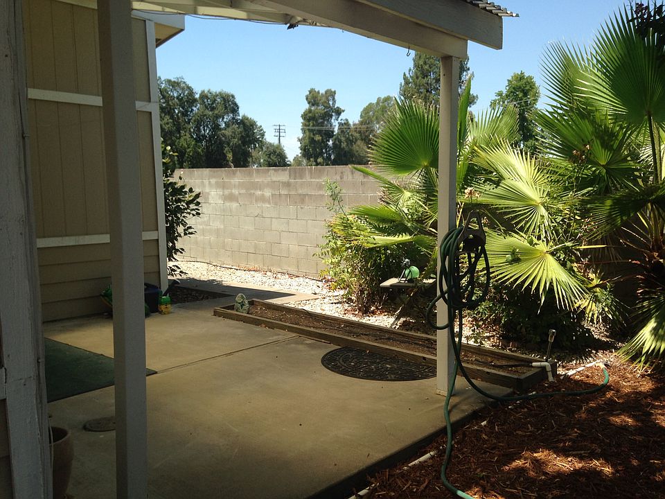 Back yard with covered patio