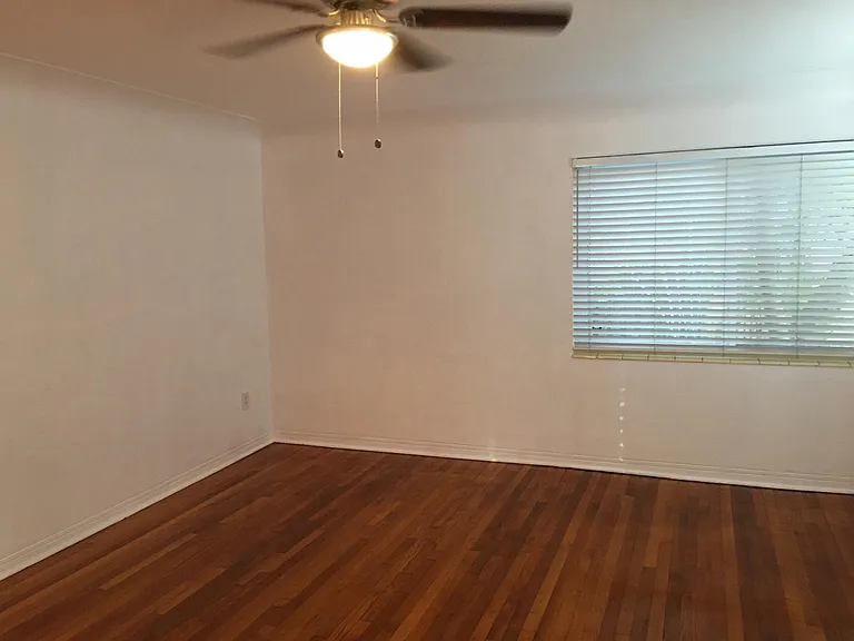 Living room, large windows on two walls, central air and ceiling fans
