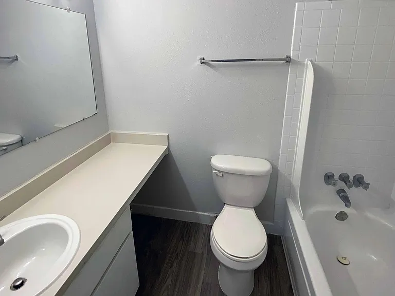 Step into your private haven in our spacious bathrooms, boasting generous countertops and large mirrors for your daily indulgence.