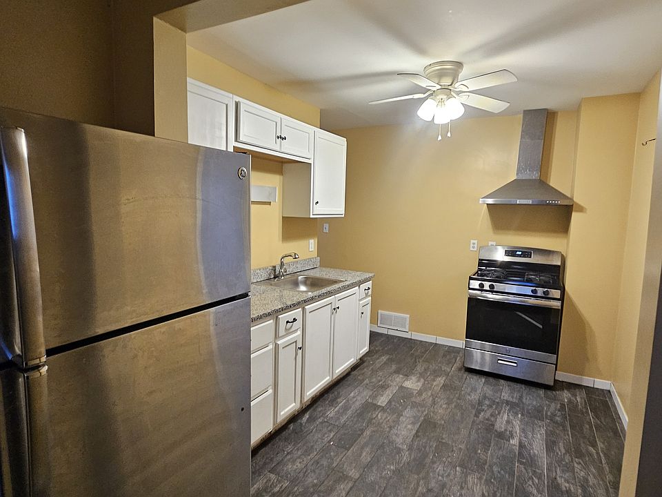 stainless stove and refrigerator in the kitchen