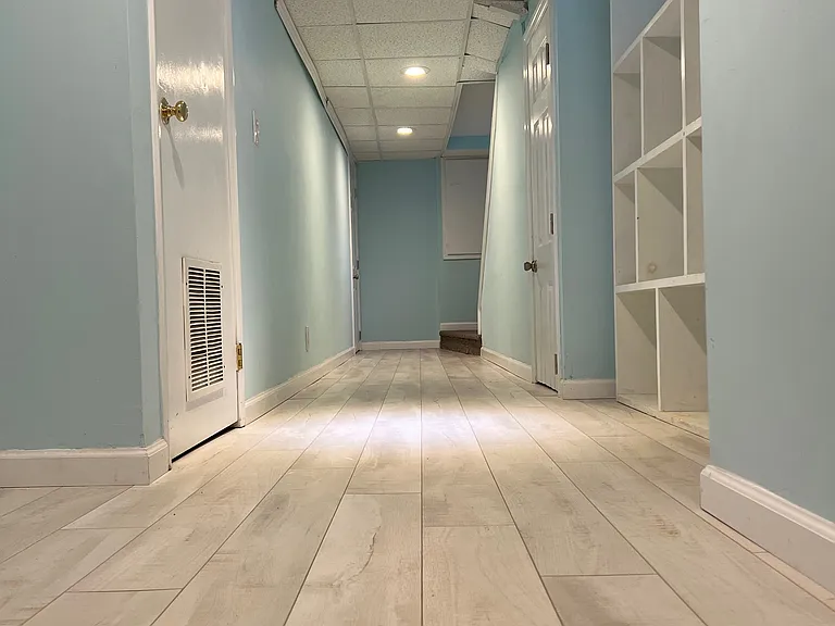 Brand new panel flooring in hallways and bedroom.