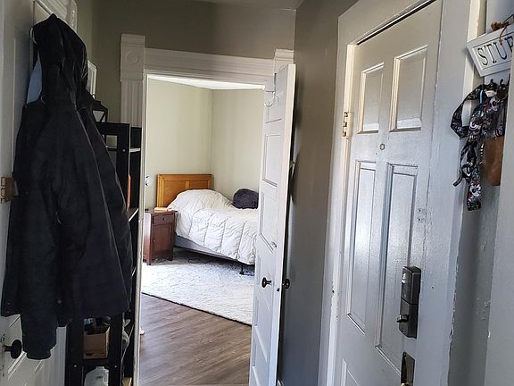 Entry/balcony exit and hall to bedroom 2