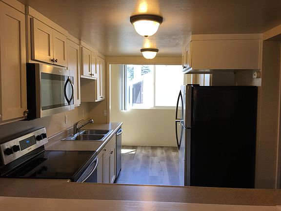 Kitchen with Stainless Steel appliances and brand new floors