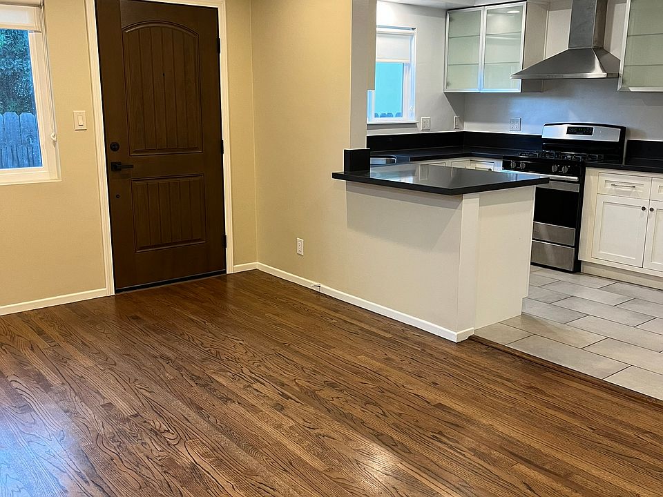 Front entrance to living room and kitchen