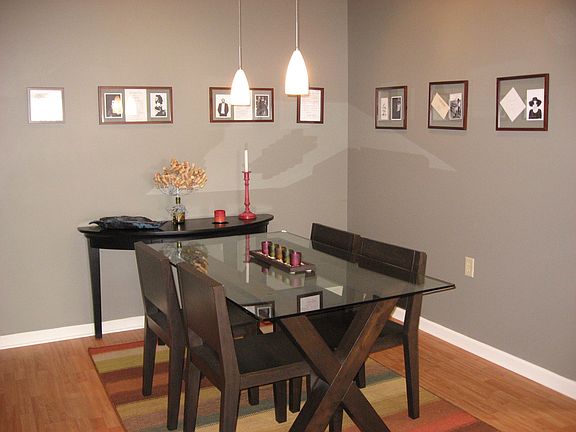 Diningroom with vaulted ceilings and modern lighting
