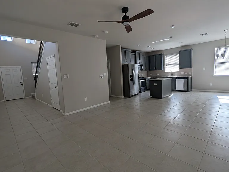 Living room, kitchen, and dining room