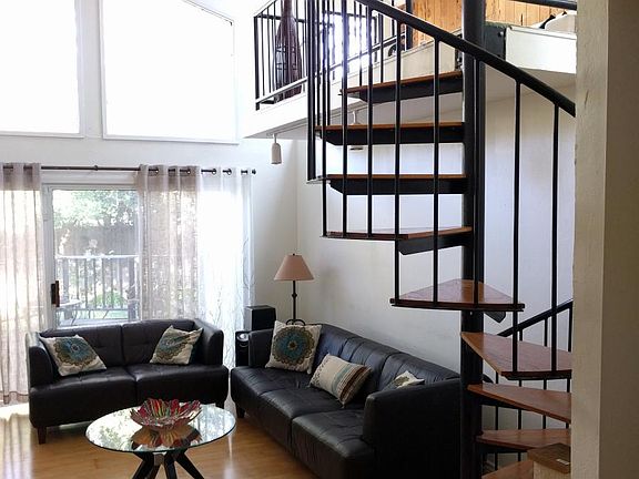 family room with stairs to Loft