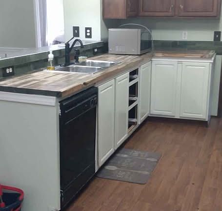 Kitchen with white finished side. Go figure why it's like this.