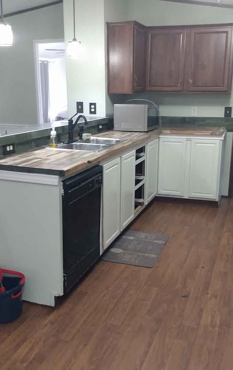 Kitchen with white finished side. Go figure why it's like this.