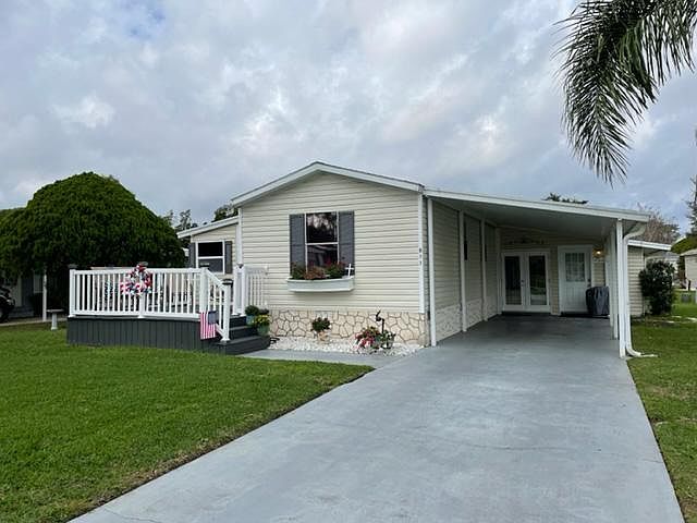 front of house showing carport