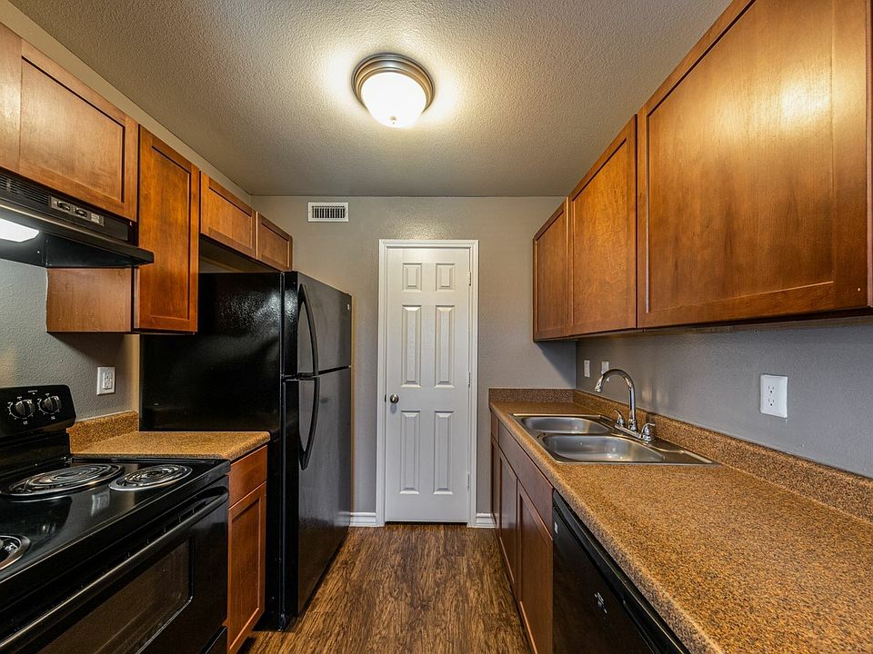 Cook with ease in this well-equipped kitchen featuring modern appliances