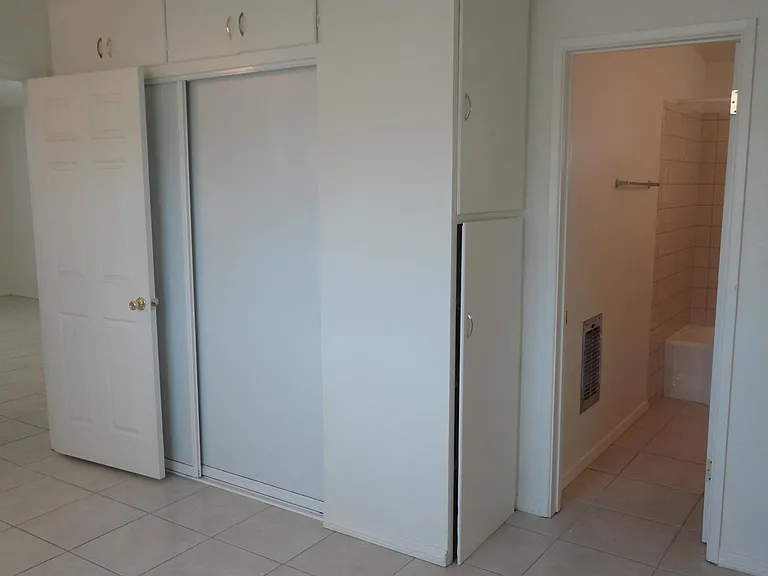 BEDROOM INTO BATH