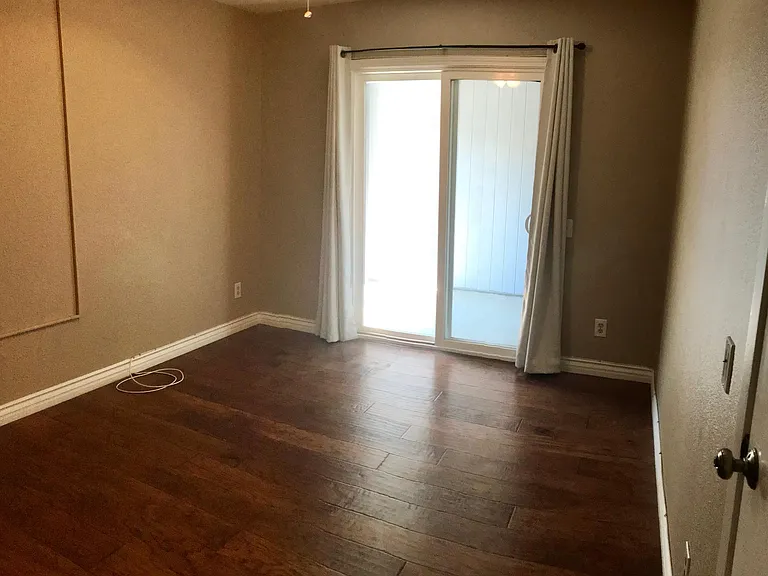 Bedroom 2 with attached patio