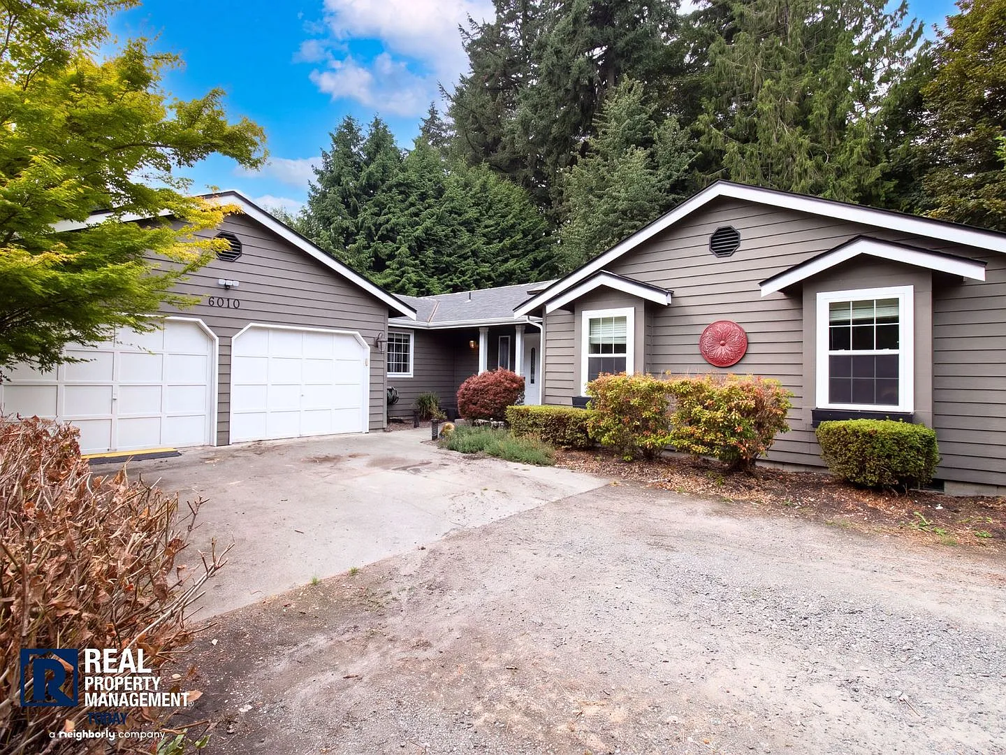 Rare Secluded Puyallup Home on a Large Parcel | Fenced Yard & 2-Car Garage — Photo 1
