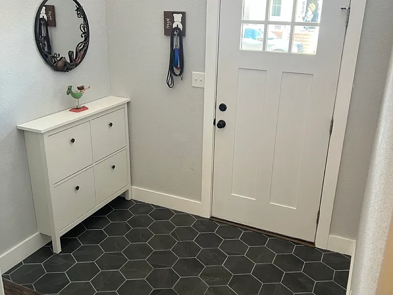 Grand entry way - new tile & shoe storage