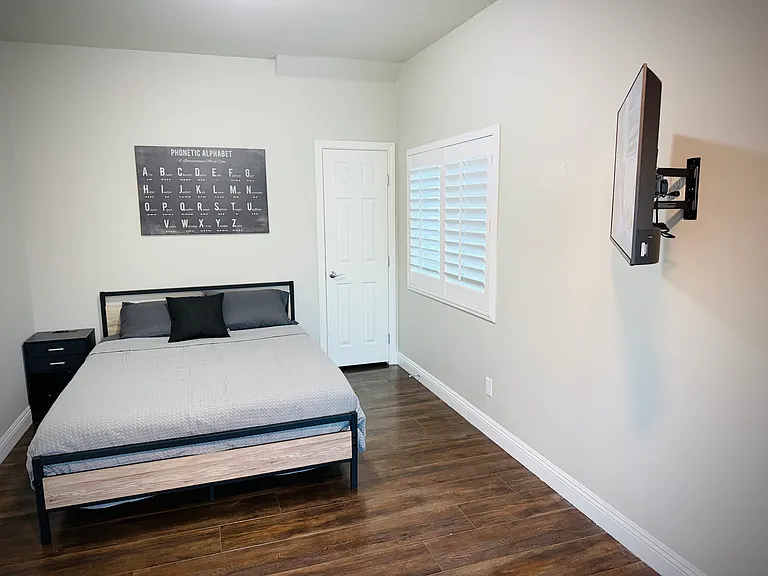 2nd floor Jr Suite. 20x10' bedroom with queen bed, new memory foam mattress, adjustable height desk, and
*TV mounted and can angle toward bed or desk.