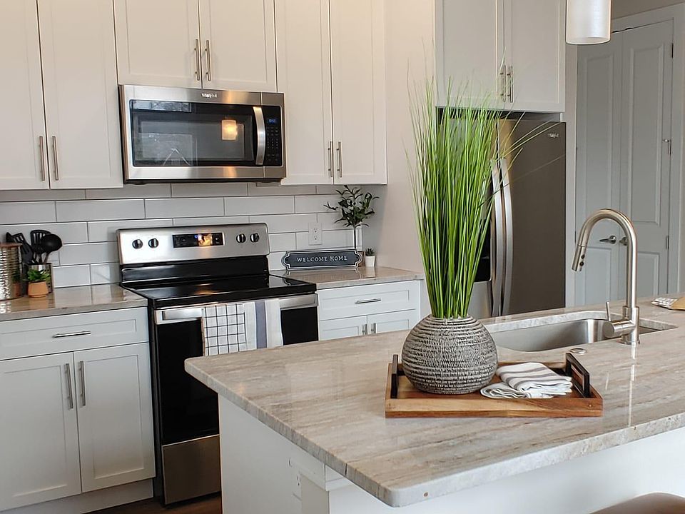 Kitchen with granite counters and breakfast bar