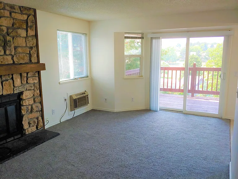 Large Living Room Looking Towards Covered Deck