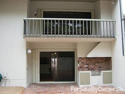 rear courtyard looking toward family room and 2nd floor master bedroom