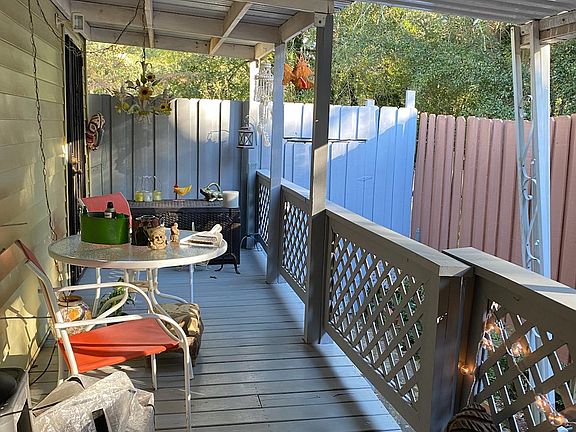 Covered side porch, gate to back yard