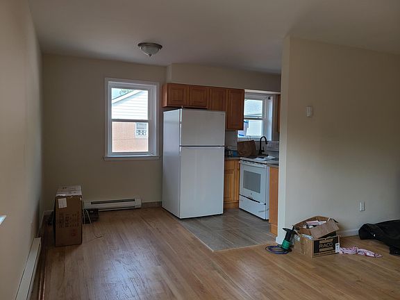 Kitchen and dining area being renovated. Appliances are being installed